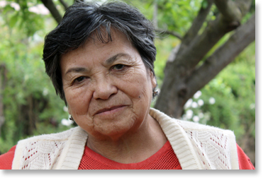 Francisca Rodriguez of Anamuri and La Vía Campesina in her garden in Lampa, Santiago, Chile. Photo by Nic Paget-Clarke.